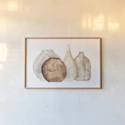 Earthy Neutral Vases IV by Chris Paschke. shown as a paper print in a natural frame. Available as a archival giclee rolled canvas, fine art paper, or poster print. SKU 77194i.