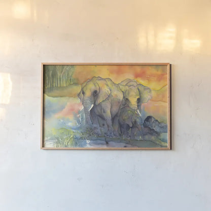 Elephants by Chris Paschke. shown as a paper print in a natural frame. Available as a archival giclee rolled canvas, fine art paper, or poster print. SKU 44510i.