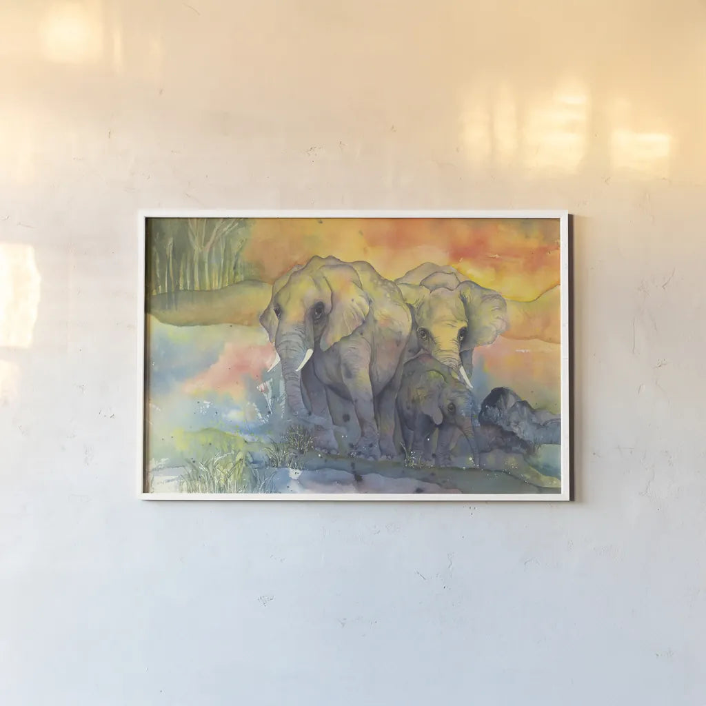 Elephants by Chris Paschke. shown as a paper print in a white frame. Available as a archival giclee rolled canvas, fine art paper, or poster print. SKU 44510i.