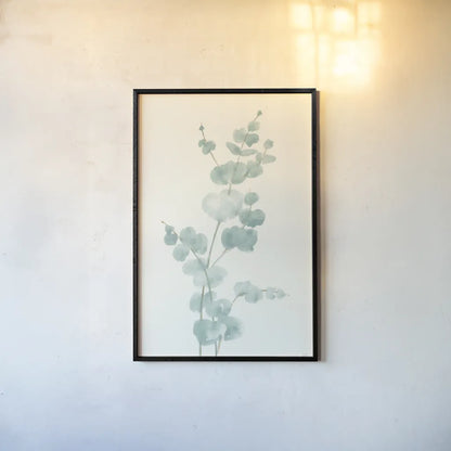 Eucalyptus Branch II by Chris Paschke. shown as a paper print in a black flame. Available as a archival giclee rolled canvas, fine art paper, or poster print. SKU 55064h.