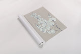 Eucalyptus Branch III Blue Gray by Chris Paschke. shown as a rolled paper print. Available as archival giclee rolled canvas, fine art paper, or poster print. SKU 56419h.