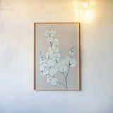 Eucalyptus Branch III Blue Gray by Chris Paschke. shown as a paper print in a natural frame. Available as a archival giclee rolled canvas, fine art paper, or poster print. SKU 56419h.