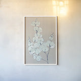 Eucalyptus Branch III Blue Gray by Chris Paschke. shown as a paper print in a white frame. Available as a archival giclee rolled canvas, fine art paper, or poster print. SKU 56419h.