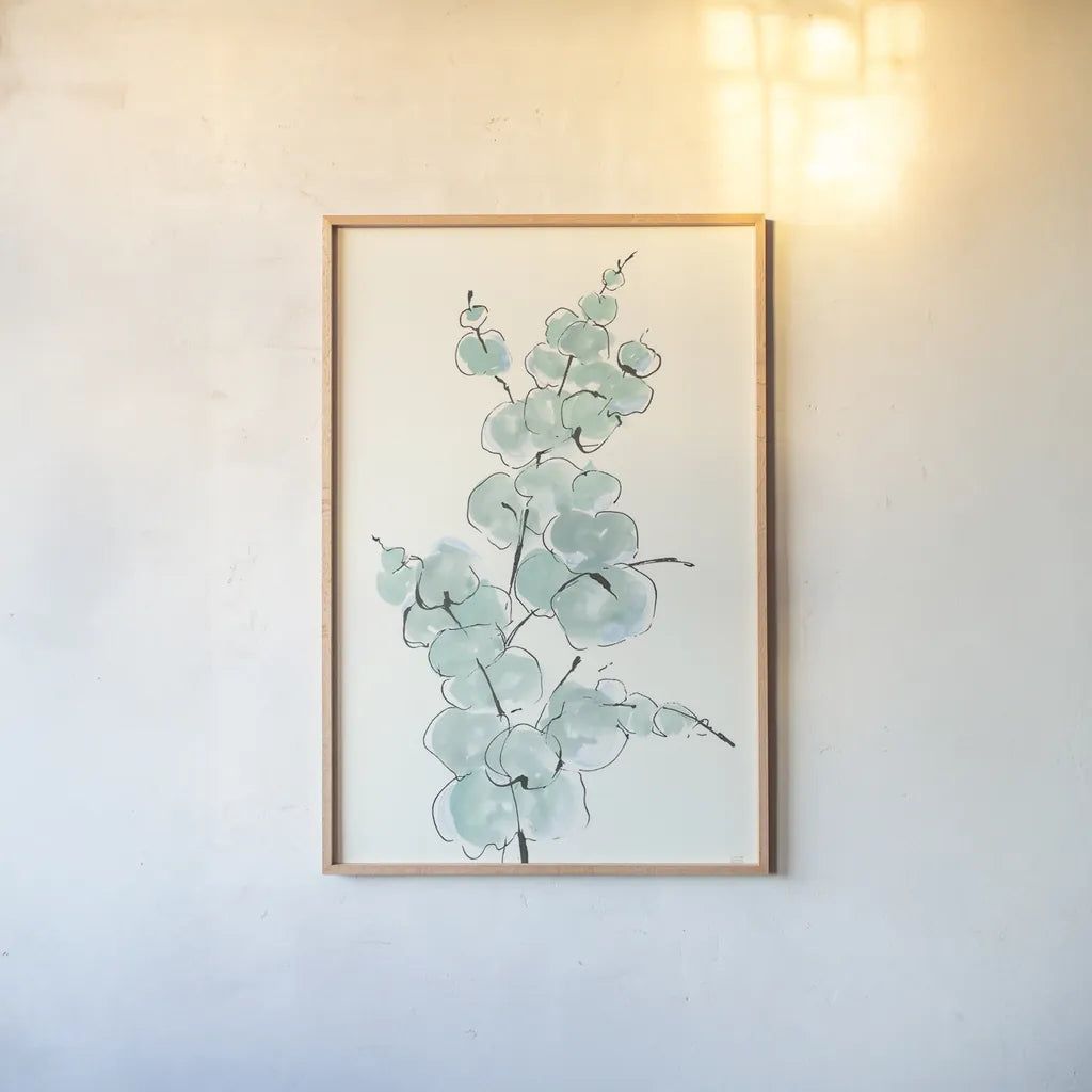 Eucalyptus Branch IV by Chris Paschke. shown as a paper print in a natural frame. Available as a archival giclee rolled canvas, fine art paper, or poster print. SKU 55066h.