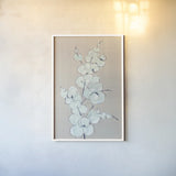 Eucalyptus Branch IV Blue Gray by Chris Paschke. shown as a paper print in a white frame. Available as a archival giclee rolled canvas, fine art paper, or poster print. SKU 56420h.