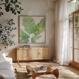 Ferns II Square by Chris Paschke. Shown in a natural wood frame in a cozy modern living room. Available as an archival giclee rolled canvas, fine art paper, or poster print. SKU 24944a.