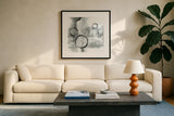 Full Circle I Gray by Chris Paschke. Displayed in a glass frame with matte in a clean modern living room. Available as an archival giclee rolled canvas, fine art paper, or poster print. SKU 22778a.