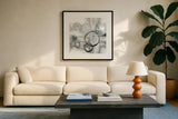 Full Circle II Gray by Chris Paschke. Displayed in a glass frame with matte in a clean modern living room. Available as an archival giclee rolled canvas, fine art paper, or poster print. SKU 22779a.