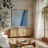 Geometrics II by Chris Paschke. Shown in a natural wood frame in a cozy modern living room. Available as an archival giclee rolled canvas, fine art paper, or poster print. SKU 68181a.