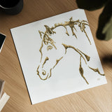 Gilded Cowpony on White by Chris Paschke. Shown as a detailed flat fine art print, highlighting archival giclee quality. Available as an archival giclee rolled canvas, fine art paper, or poster print. SKU 32635a.