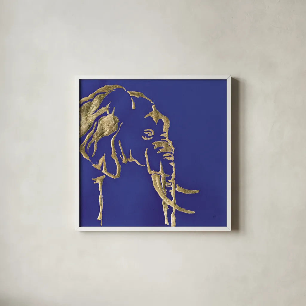 Gilded Elephant Indigo by Chris Paschke. Shown in a crisp white glass frame for a clean and minimalist style. Available as an archival giclee rolled canvas, fine art paper, or poster print. SKU 41916a.
