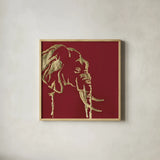 Gilded Elephant on Red by Chris Paschke. Shown in a natural wood glass frame for a timeless modern aesthetic. Available as an archival giclee rolled canvas, fine art paper, or poster print. SKU 41921a.