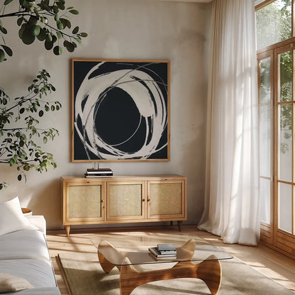 Gilded Enso IV BW by Chris Paschke. Shown in a natural wood frame in a cozy modern living room. Available as an archival giclee rolled canvas, fine art paper, or poster print. SKU 54819a.