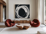 Gilded Enso IV BW by Chris Paschke. Shown as extra-large giant wall art in a modern living room. Available as an archival giclee rolled canvas, fine art paper, or poster print. SKU 54819a.