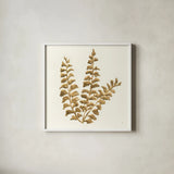 Gilded Fern III by Chris Paschke. Shown in a crisp white glass frame for a clean and minimalist style. Available as an archival giclee rolled canvas, fine art paper, or poster print. SKU 57197a.