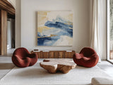 Gilded Indigo I by Chris Paschke. Shown as extra-large giant wall art in a modern living room. Available as an archival giclee rolled canvas, fine art paper, or poster print. SKU 25553a.