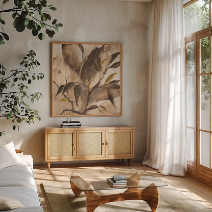 Gilded Leaf Collage I by Chris Paschke. Shown in a natural wood frame in a cozy modern living room. Available as an archival giclee rolled canvas, fine art paper, or poster print. SKU 96187a.