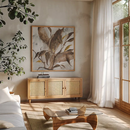 Gilded Leaf Collage v2 I by Chris Paschke. Shown in a natural wood frame in a cozy modern living room. Available as an archival giclee rolled canvas, fine art paper, or poster print. SKU 97047a.