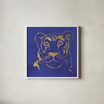 Gilded Lioness Indigo by Chris Paschke. Shown in a crisp white glass frame for a clean and minimalist style. Available as an archival giclee rolled canvas, fine art paper, or poster print. SKU 41918a.