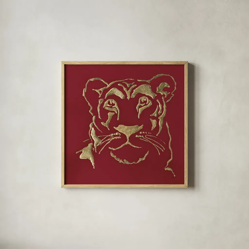 Gilded Lioness on Red by Chris Paschke. Shown in a natural wood glass frame for a timeless modern aesthetic. Available as an archival giclee rolled canvas, fine art paper, or poster print. SKU 41923a.