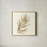 Gilded Palm I by Chris Paschke. Shown in a natural wood glass frame for a timeless modern aesthetic. Available as an archival giclee rolled canvas, fine art paper, or poster print. SKU 57199a.
