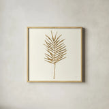 Gilded Palm VI by Chris Paschke. Shown in a natural wood glass frame for a timeless modern aesthetic. Available as an archival giclee rolled canvas, fine art paper, or poster print. SKU 57204a.
