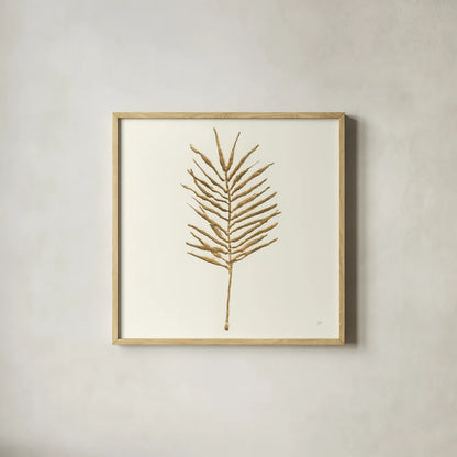 Gilded Palm VI by Chris Paschke. Shown in a natural wood glass frame for a timeless modern aesthetic. Available as an archival giclee rolled canvas, fine art paper, or poster print. SKU 57204a.