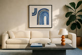 Gilded Rainbow I by Chris Paschke. Displayed in a glass frame with matte in a clean modern living room. Available as an archival giclee rolled canvas, fine art paper, or poster print. SKU 68185a.