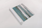 Gilded Storm I Teal Grey by Chris Paschke. shown as a rolled paper print. Available as archival giclee rolled canvas, fine art paper, or poster print. SKU 27534i.