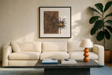 Gilded Thistle I by Chris Paschke. Displayed in a glass frame with matte in a clean modern living room. Available as an archival giclee rolled canvas, fine art paper, or poster print. SKU 96185a.