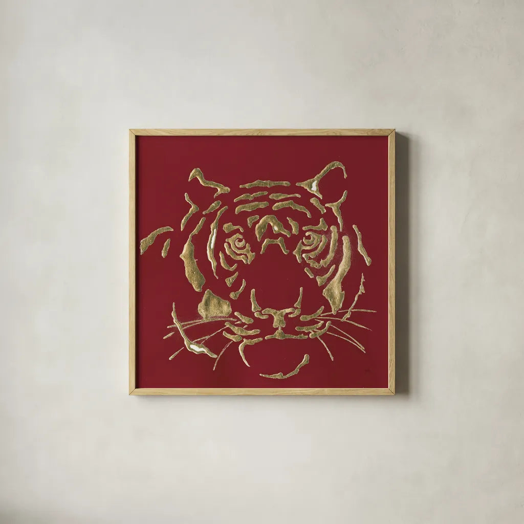Gilded Tiger on Red by Chris Paschke. Shown in a natural wood glass frame for a timeless modern aesthetic. Available as an archival giclee rolled canvas, fine art paper, or poster print. SKU 41924a.