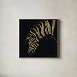 Gilded Zebra on Black by Chris Paschke. Shown in a sleek black glass frame for a contemporary gallery look. Available as an archival giclee rolled canvas, fine art paper, or poster print. SKU 31575a.