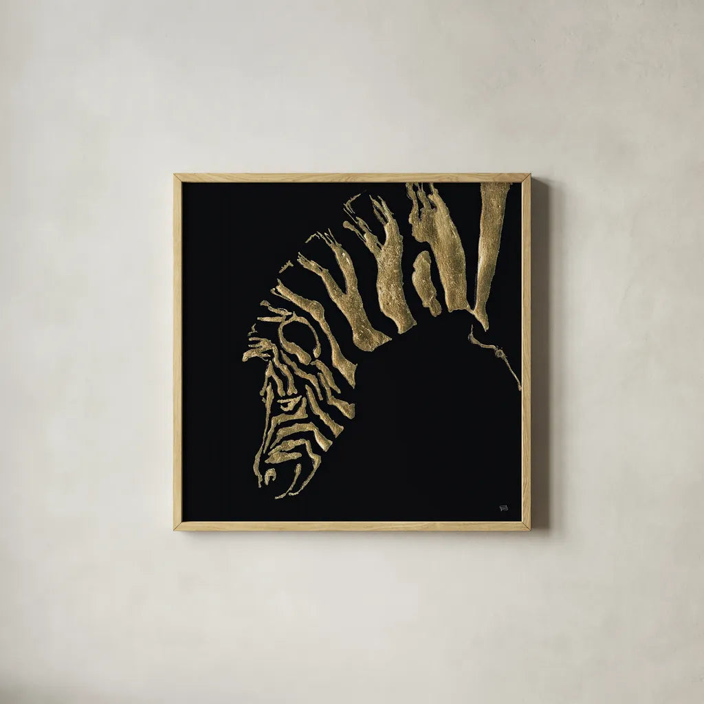 Gilded Zebra on Black by Chris Paschke. Shown in a natural wood glass frame for a timeless modern aesthetic. Available as an archival giclee rolled canvas, fine art paper, or poster print. SKU 31575a.