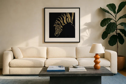 Gilded Zebra on Black by Chris Paschke. Displayed in a glass frame with matte in a clean modern living room. Available as an archival giclee rolled canvas, fine art paper, or poster print. SKU 31575a.