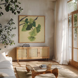 Gingko Leaves I Dark by Chris Paschke. Shown in a natural wood frame in a cozy modern living room. Available as an archival giclee rolled canvas, fine art paper, or poster print. SKU 31586a.