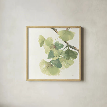 Gingko Leaves II on White by Chris Paschke. Shown in a natural wood glass frame for a timeless modern aesthetic. Available as an archival giclee rolled canvas, fine art paper, or poster print. SKU 30859a.