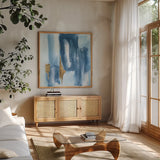 Glacier VII by Chris Paschke. Shown in a natural wood frame in a cozy modern living room. Available as an archival giclee rolled canvas, fine art paper, or poster print. SKU 68196a.