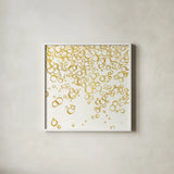 Gold Bubbles I by Chris Paschke. Shown in a crisp white glass frame for a clean and minimalist style. Available as an archival giclee rolled canvas, fine art paper, or poster print. SKU 68833a.