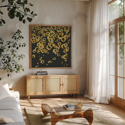 Gold Bubbles II by Chris Paschke. Shown in a natural wood frame in a cozy modern living room. Available as an archival giclee rolled canvas, fine art paper, or poster print. SKU 68834a.