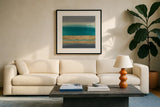 Gold Emerald I by Chris Paschke. Displayed in a glass frame with matte in a clean modern living room. Available as an archival giclee rolled canvas, fine art paper, or poster print. SKU 75469a.