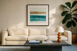 Gold Emerald III by Chris Paschke. Displayed in a glass frame with matte in a clean modern living room. Available as an archival giclee rolled canvas, fine art paper, or poster print. SKU 75471a.