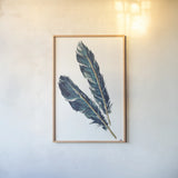 Gold Feathers III Indigo by Chris Paschke. shown as a paper print in a natural frame. Available as a archival giclee rolled canvas, fine art paper, or poster print. SKU 26437h.