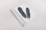 Gold Feathers IV Indigo by Chris Paschke. shown as a rolled paper print. Available as archival giclee rolled canvas, fine art paper, or poster print. SKU 26438h.