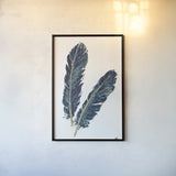 Gold Feathers IV Indigo by Chris Paschke. shown as a paper print in a black flame. Available as a archival giclee rolled canvas, fine art paper, or poster print. SKU 26438h.