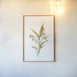 Gold Line Lily of the Valley I by Chris Paschke. shown as a paper print in a natural frame. Available as a archival giclee rolled canvas, fine art paper, or poster print. SKU 69566h.