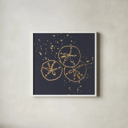 Gold Sand Dollar II by Chris Paschke. Shown in a crisp white glass frame for a clean and minimalist style. Available as an archival giclee rolled canvas, fine art paper, or poster print. SKU 69355a.