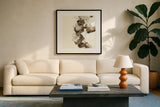 Gold Squares II by Chris Paschke. Displayed in a glass frame with matte in a clean modern living room. Available as an archival giclee rolled canvas, fine art paper, or poster print. SKU 31744a.
