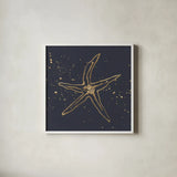 Gold Starfish II by Chris Paschke. Shown in a crisp white glass frame for a clean and minimalist style. Available as an archival giclee rolled canvas, fine art paper, or poster print. SKU 69362a.