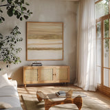 Gold and Gray Sand II by Chris Paschke. Shown in a natural wood frame in a cozy modern living room. Available as an archival giclee rolled canvas, fine art paper, or poster print. SKU 75462a.