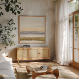 Gold and Gray Sand III by Chris Paschke. Shown in a natural wood frame in a cozy modern living room. Available as an archival giclee rolled canvas, fine art paper, or poster print. SKU 75463a.